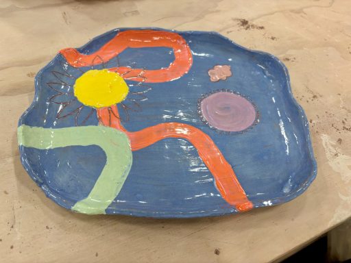 hand built plate, terracotta with colored slip and glaze | love, nina art | ceramics by nina herndon 